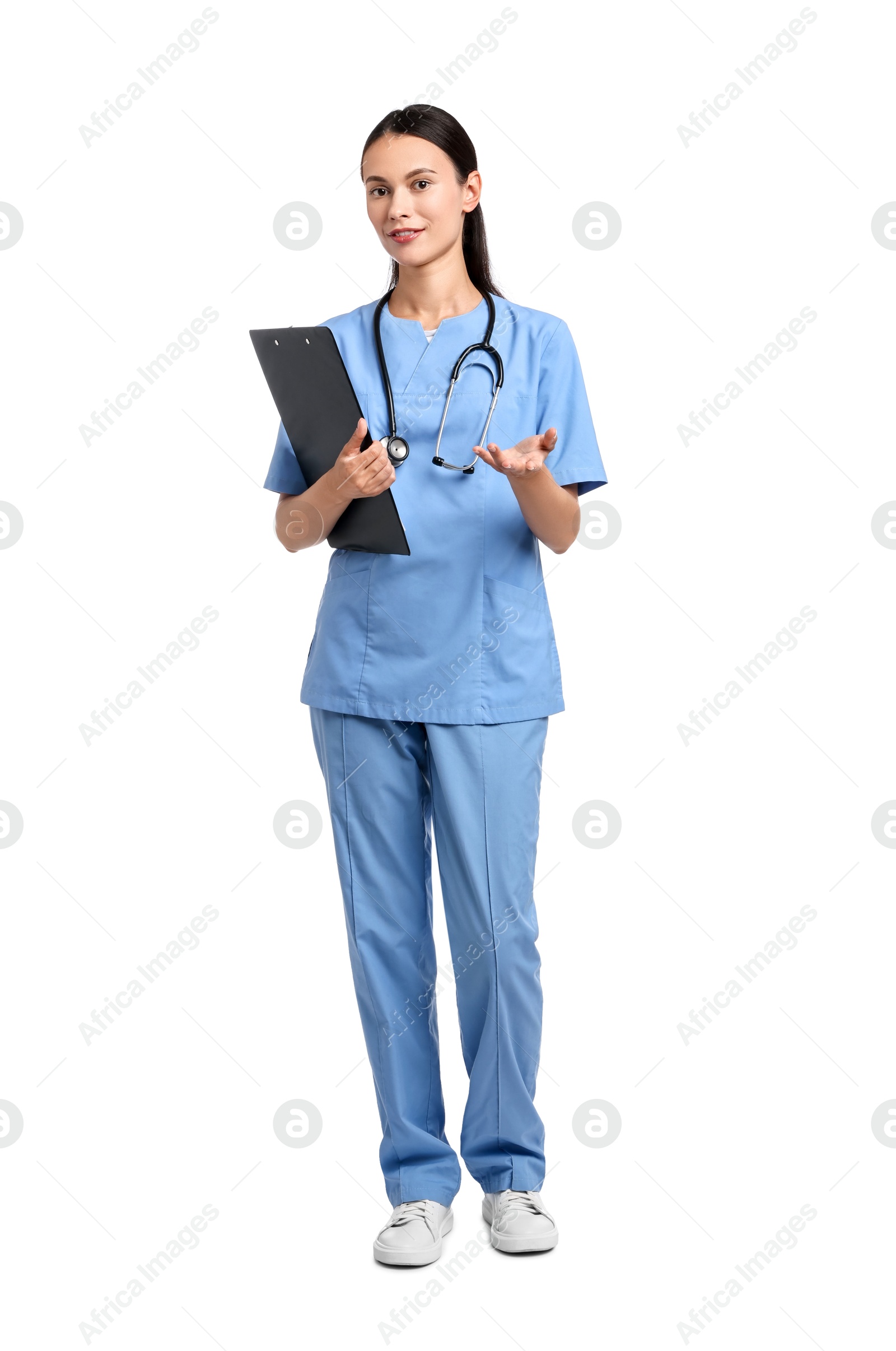 Photo of Smiling nurse with clipboard holding something on white background