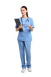 Smiling nurse with clipboard holding something on white background