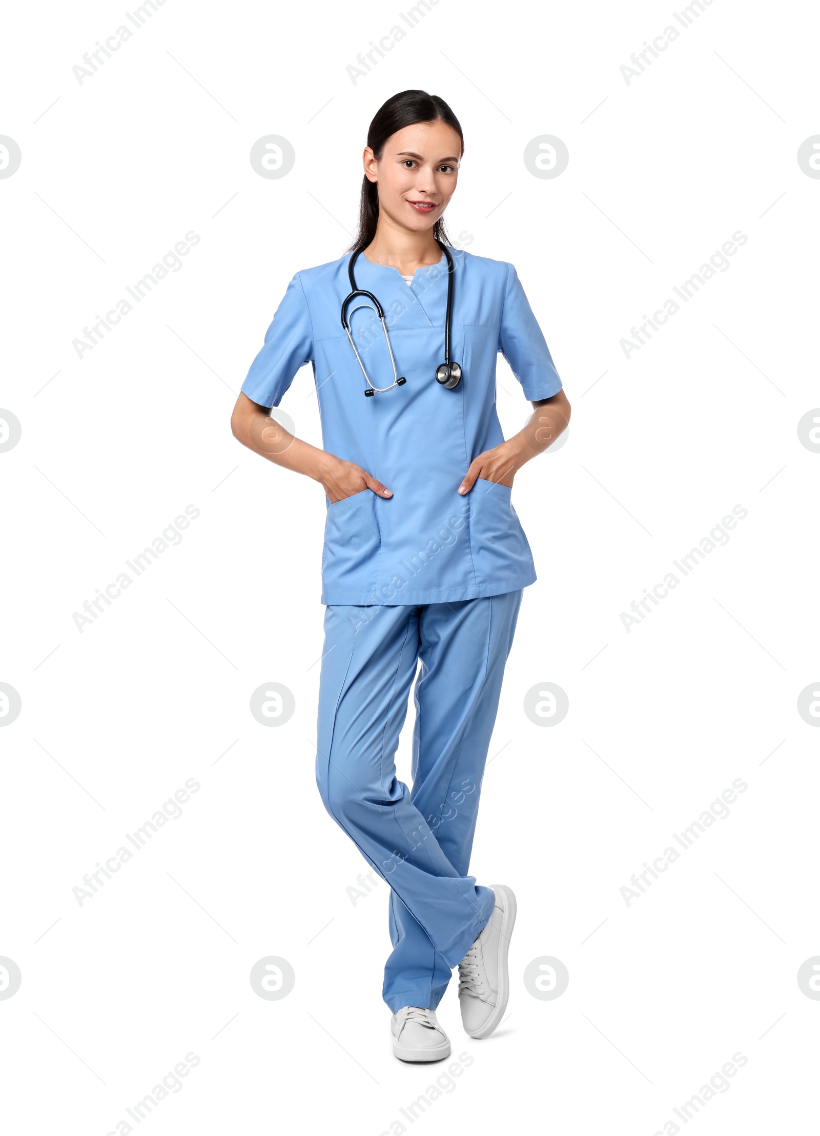 Photo of Smiling nurse in uniform on white background