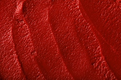 Texture of ketchup as background, top view. Tomato sauce