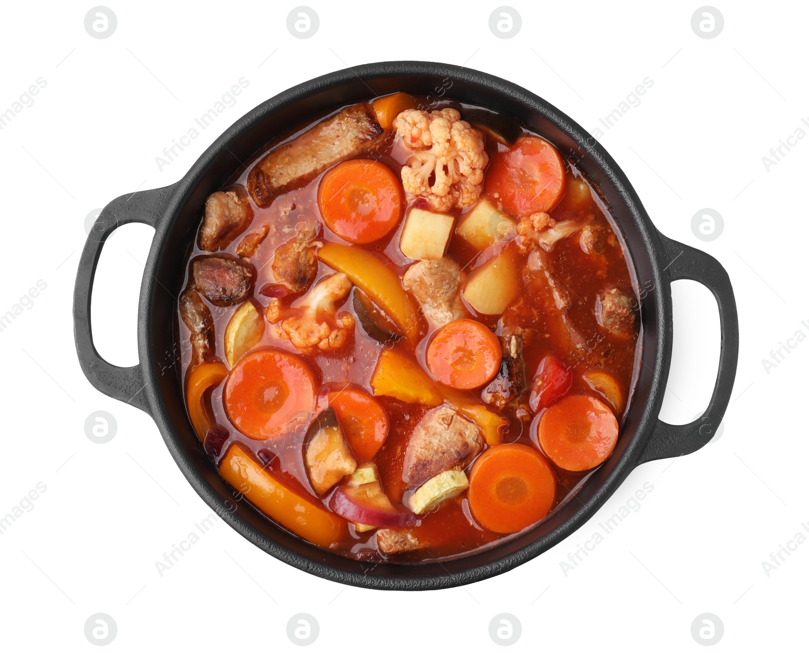 Photo of Tasty homemade stew with vegetables in dish isolated on white, top view