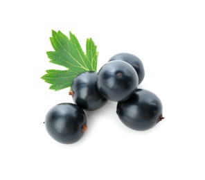 Ripe blackcurrants and green leaf isolated on white, top view