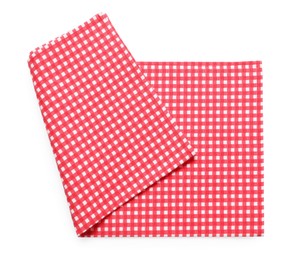 Photo of Red checkered picnic tablecloth isolated on white, top view