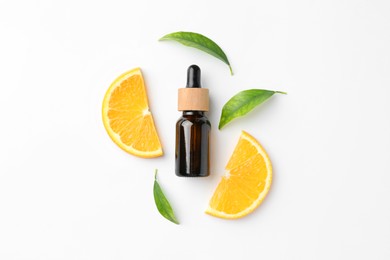 Bottle of essential oil, orange and green leaves on white background, flat lay