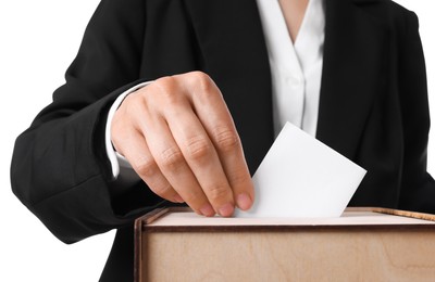 Photo of Woman putting her vote into ballot box against white background, closeup