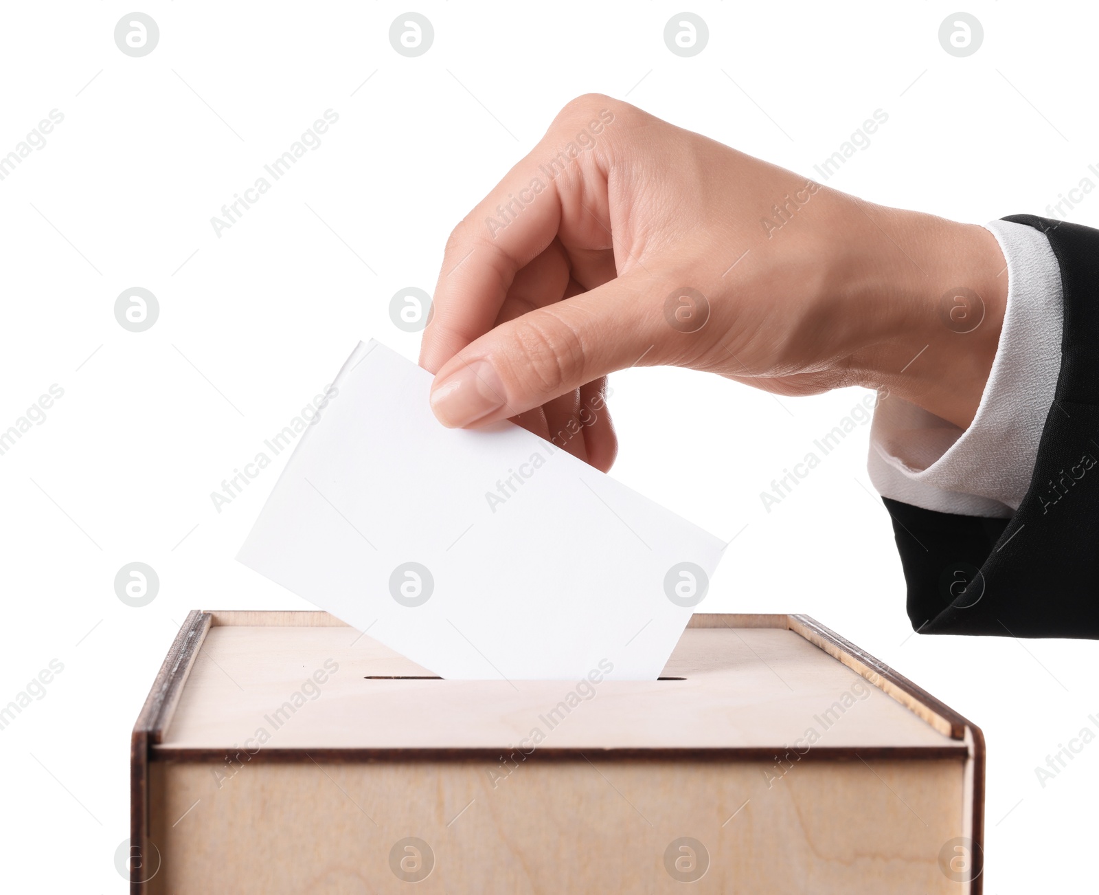 Photo of Woman putting her vote into ballot box against white background, closeup