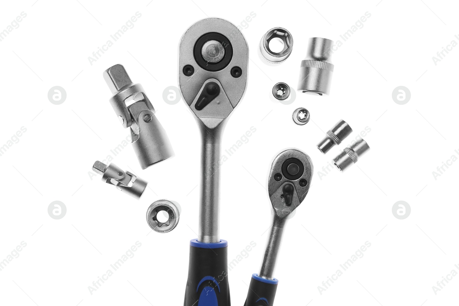 Photo of Two torque wrenches and nuts on white, flat lay. Auto mechanic tools