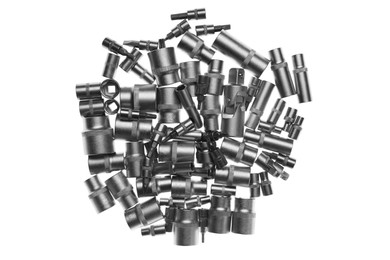 Pile of spark plug sockets on white background, top view. Auto mechanic tools