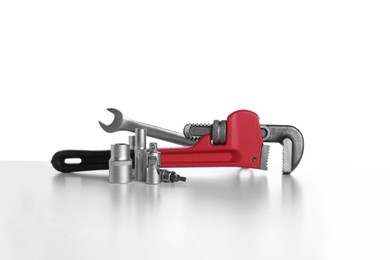 Set of auto mechanic's tools on white background