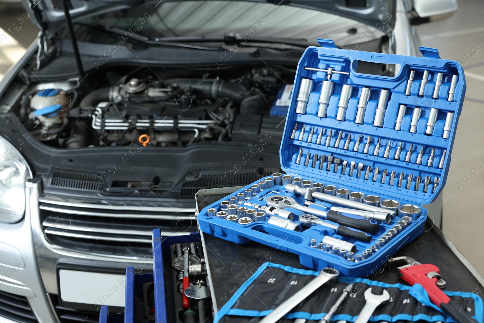 Photo of Set of different auto mechanic's tools indoors