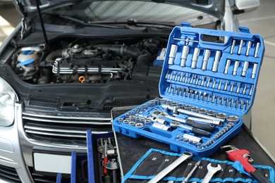 Photo of Set of different auto mechanic's tools indoors