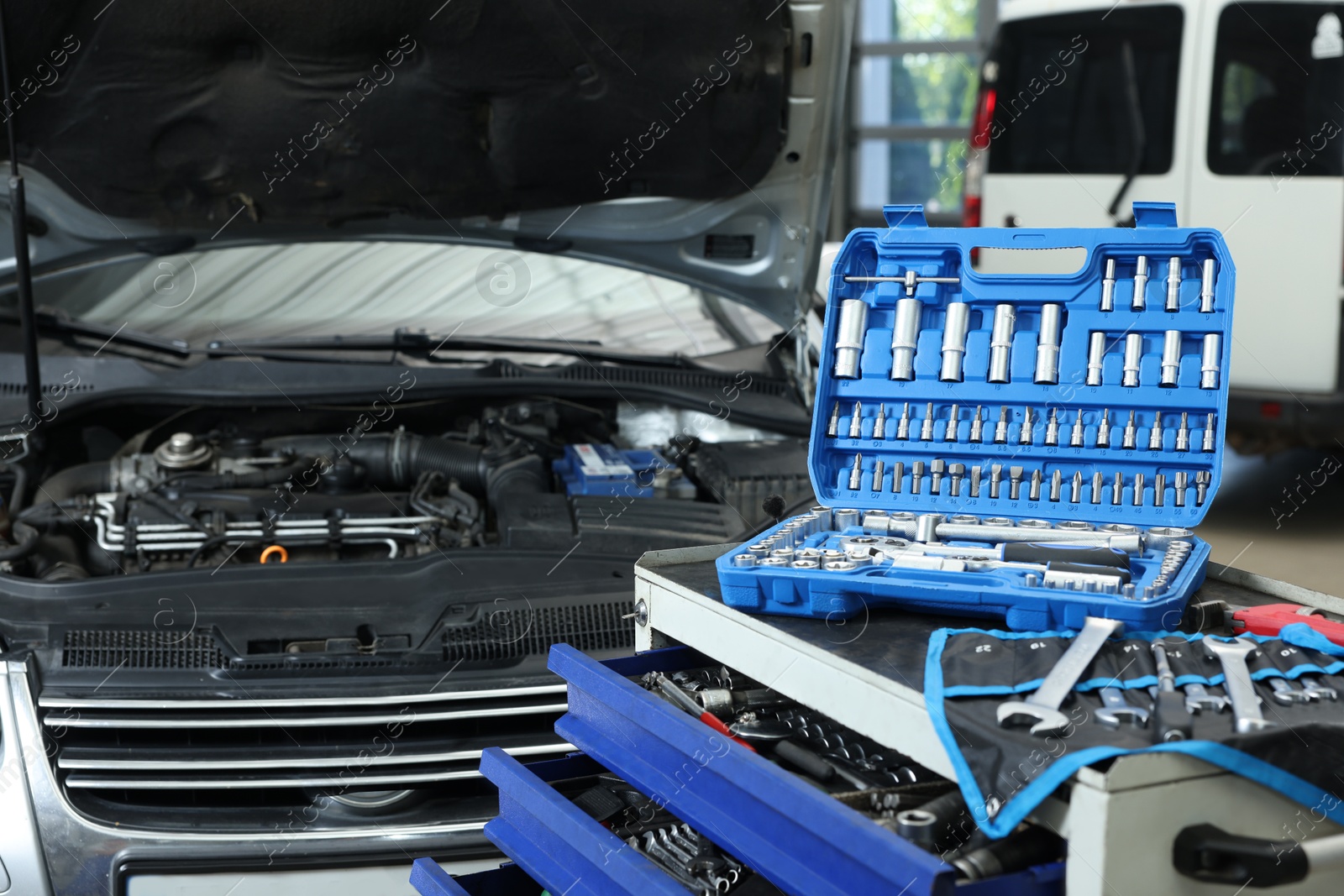 Photo of Set of different auto mechanic's tools indoors