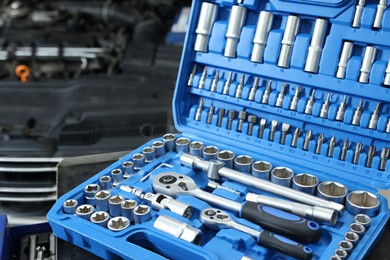 Photo of Set of different auto mechanic's tools indoors, closeup