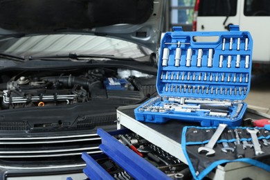 Photo of Set of different auto mechanic's tools indoors