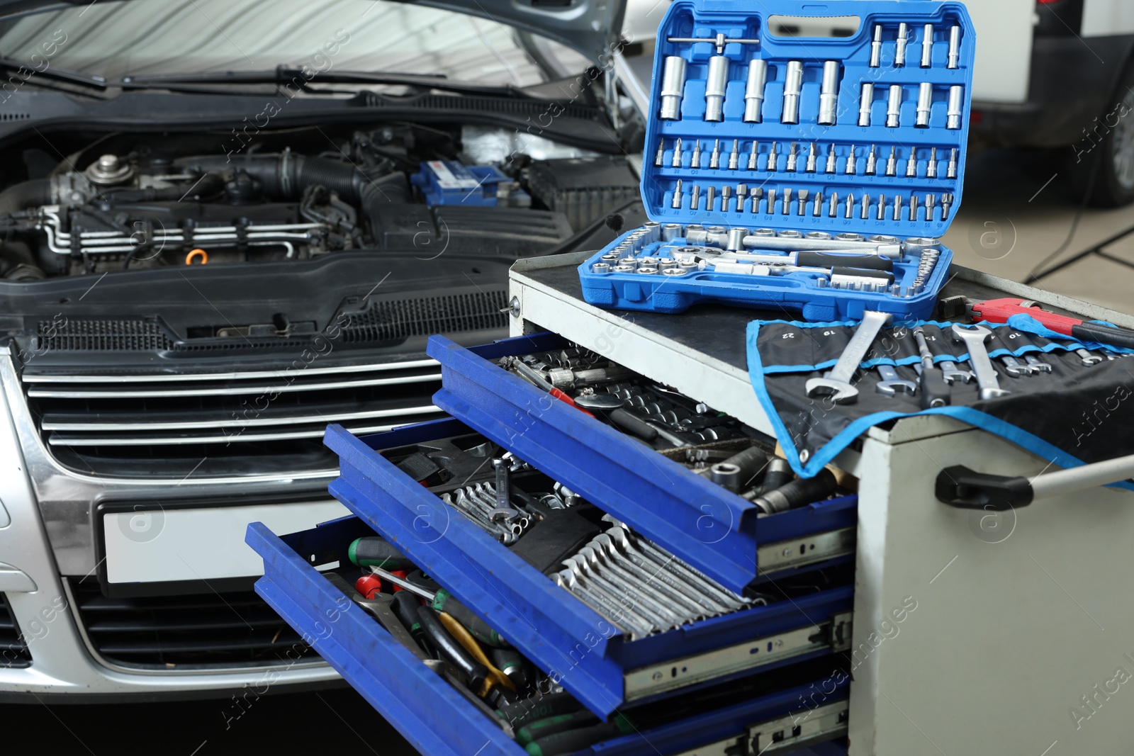 Photo of Set of different auto mechanic's tools indoors