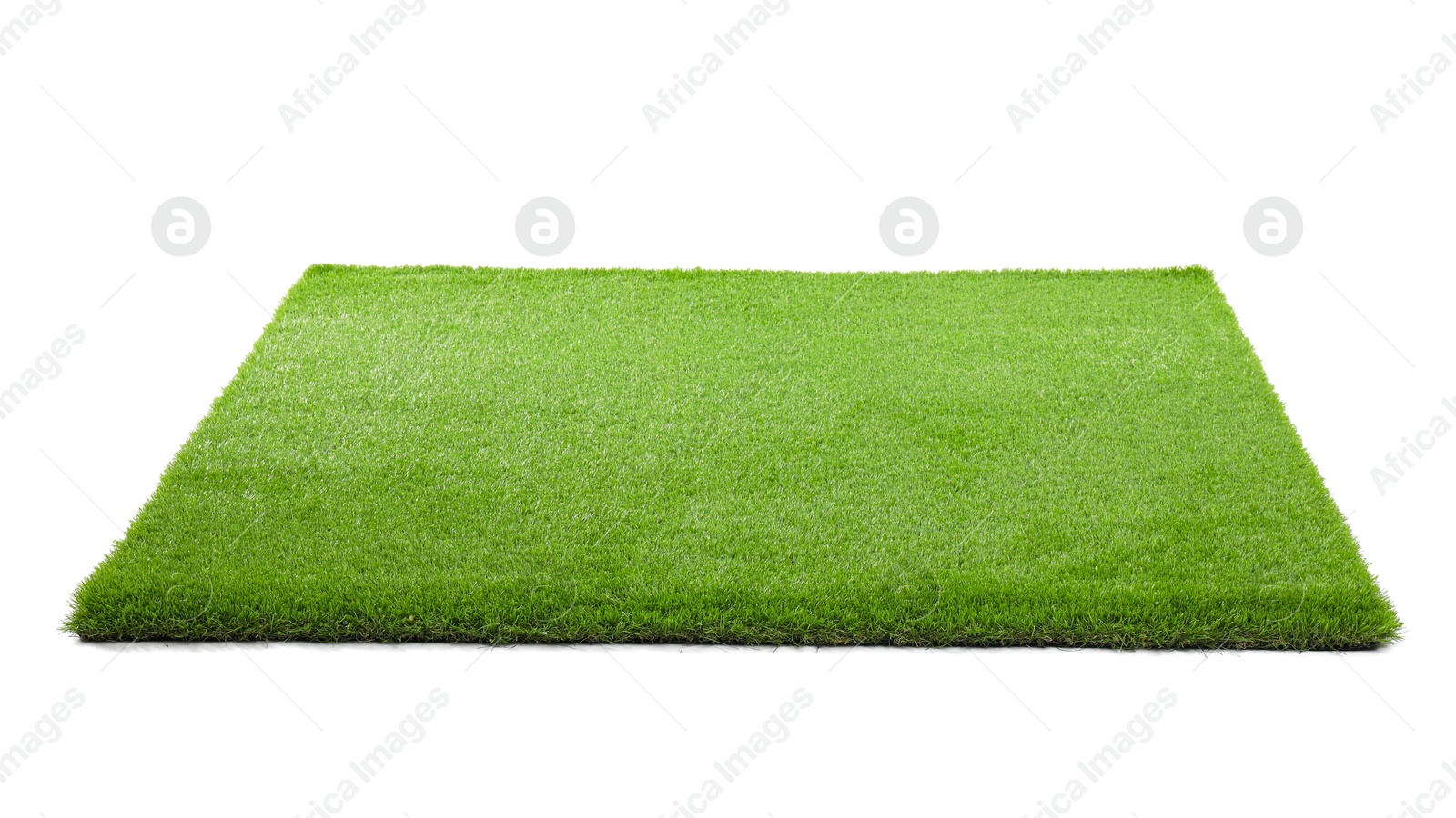 Photo of Green artificial grass isolated on white. Garden decor