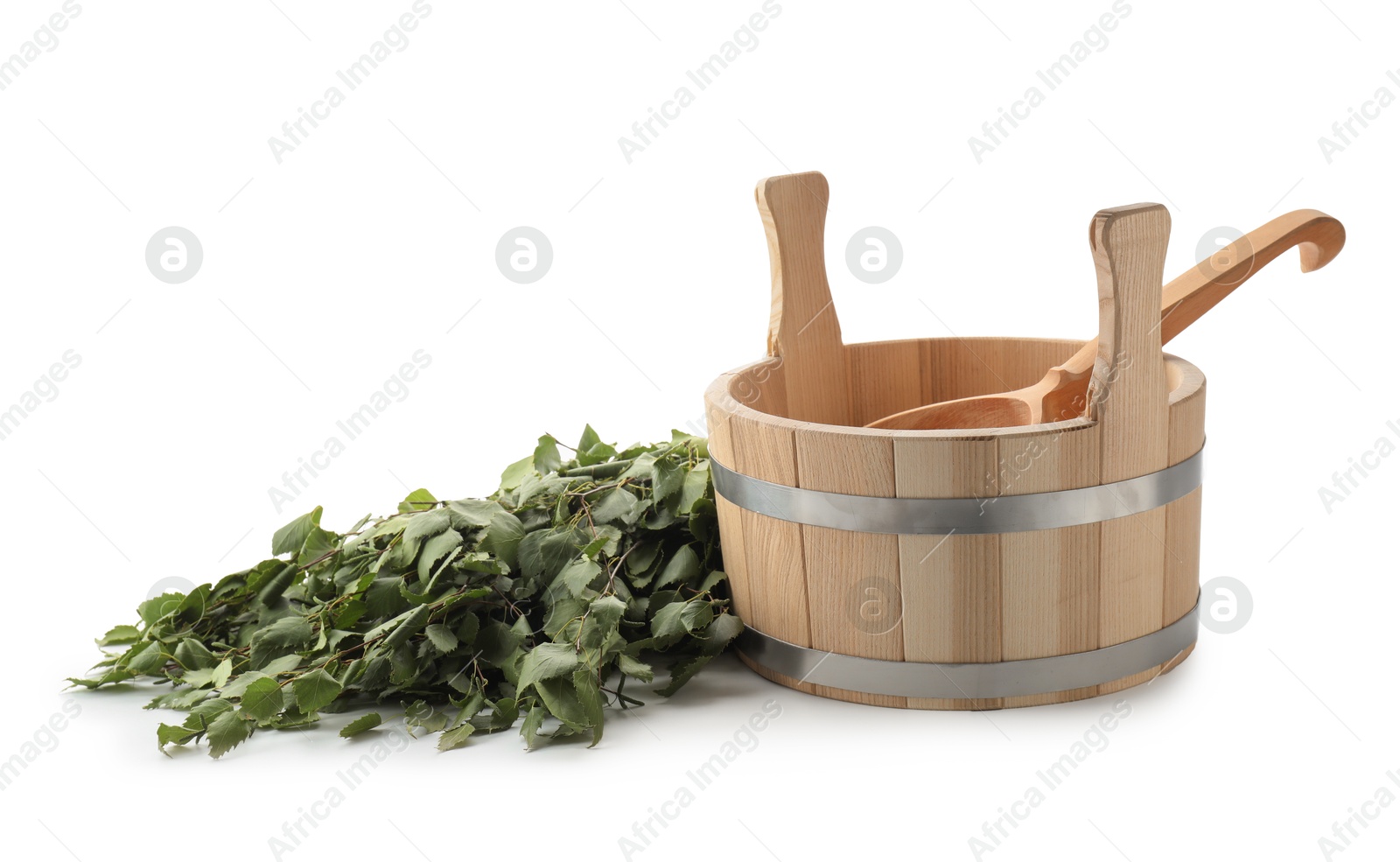 Photo of Sauna equipment. Wooden bucket with ladle and birch whisk isolated on white