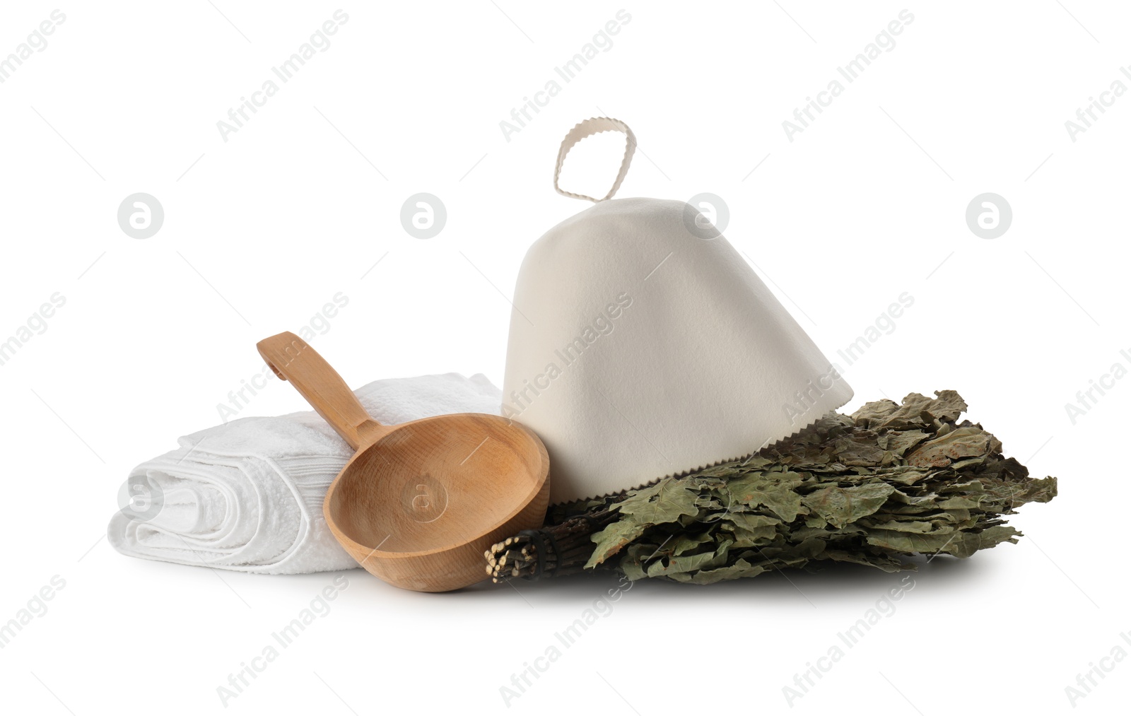 Photo of Sauna equipment. Felt wool hat, oak whisk, wooden ladle and towel isolated on white