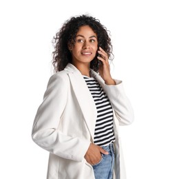 Beautiful woman in stylish jacket talking on smartphone against white background