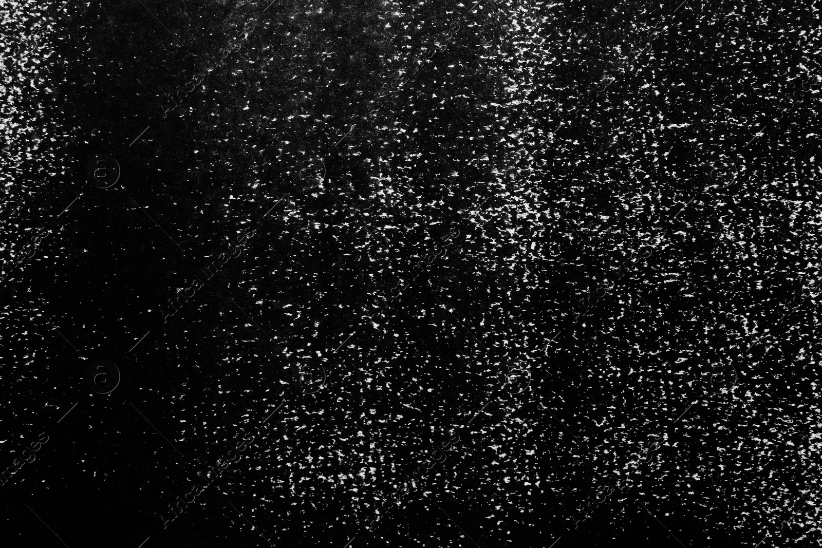 Photo of Texture of paper with black ink as background, top view