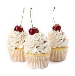 Photo of Delicious cupcakes with cream and cherries isolated on white