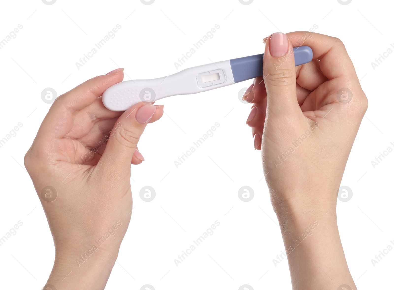 Photo of Woman holding pregnancy test on white background, closeup