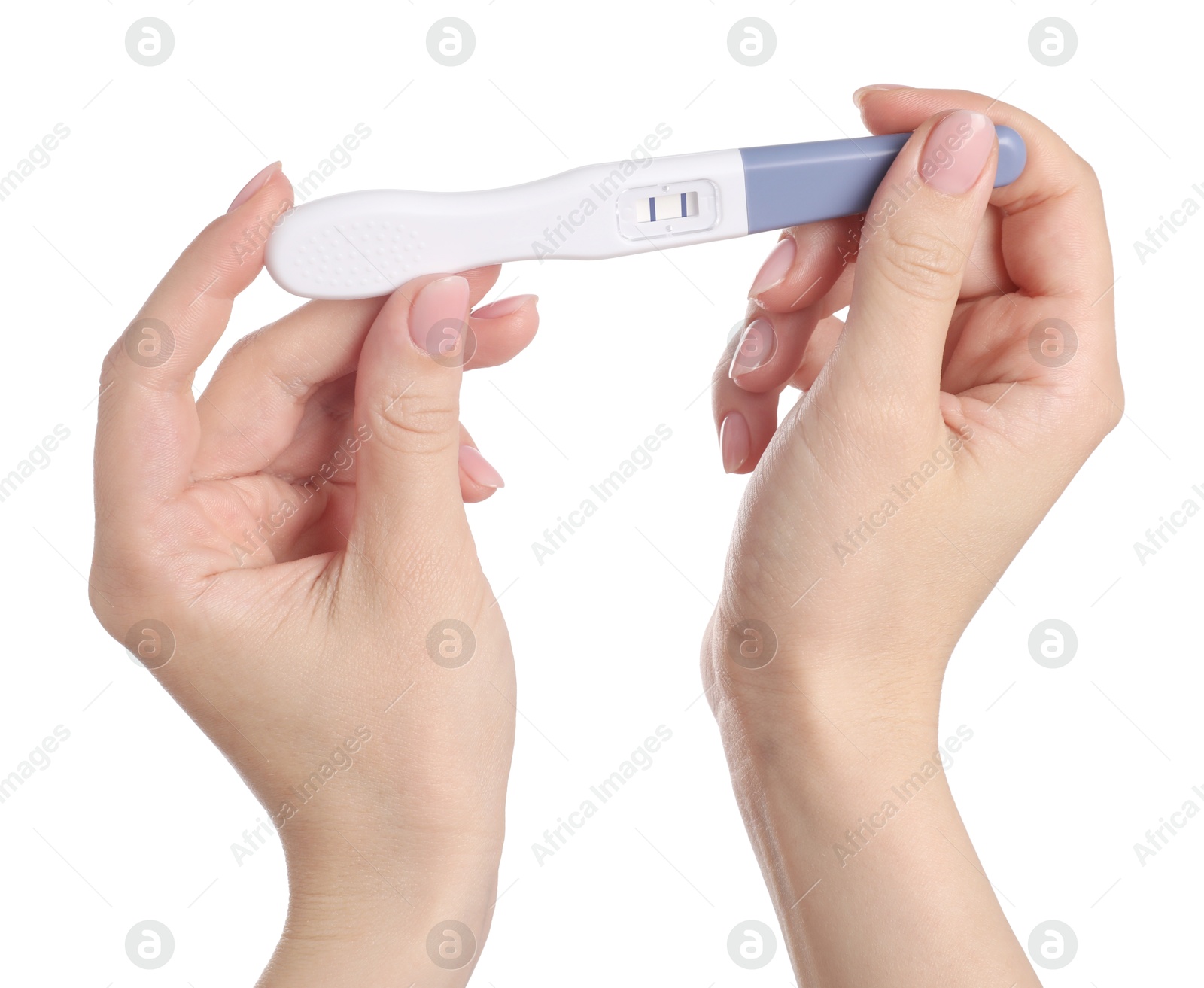 Photo of Woman holding pregnancy test on white background, closeup