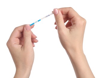 Photo of Woman holding pregnancy test on white background, closeup