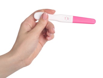 Photo of Woman holding pregnancy test on white background, closeup