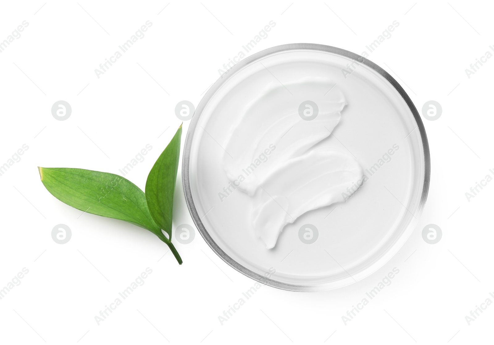 Photo of Petri dish with cosmetic product and leaves isolated on white, top view