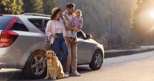 Parents, their daughter and dog near car outdoors. Banner design with space for text