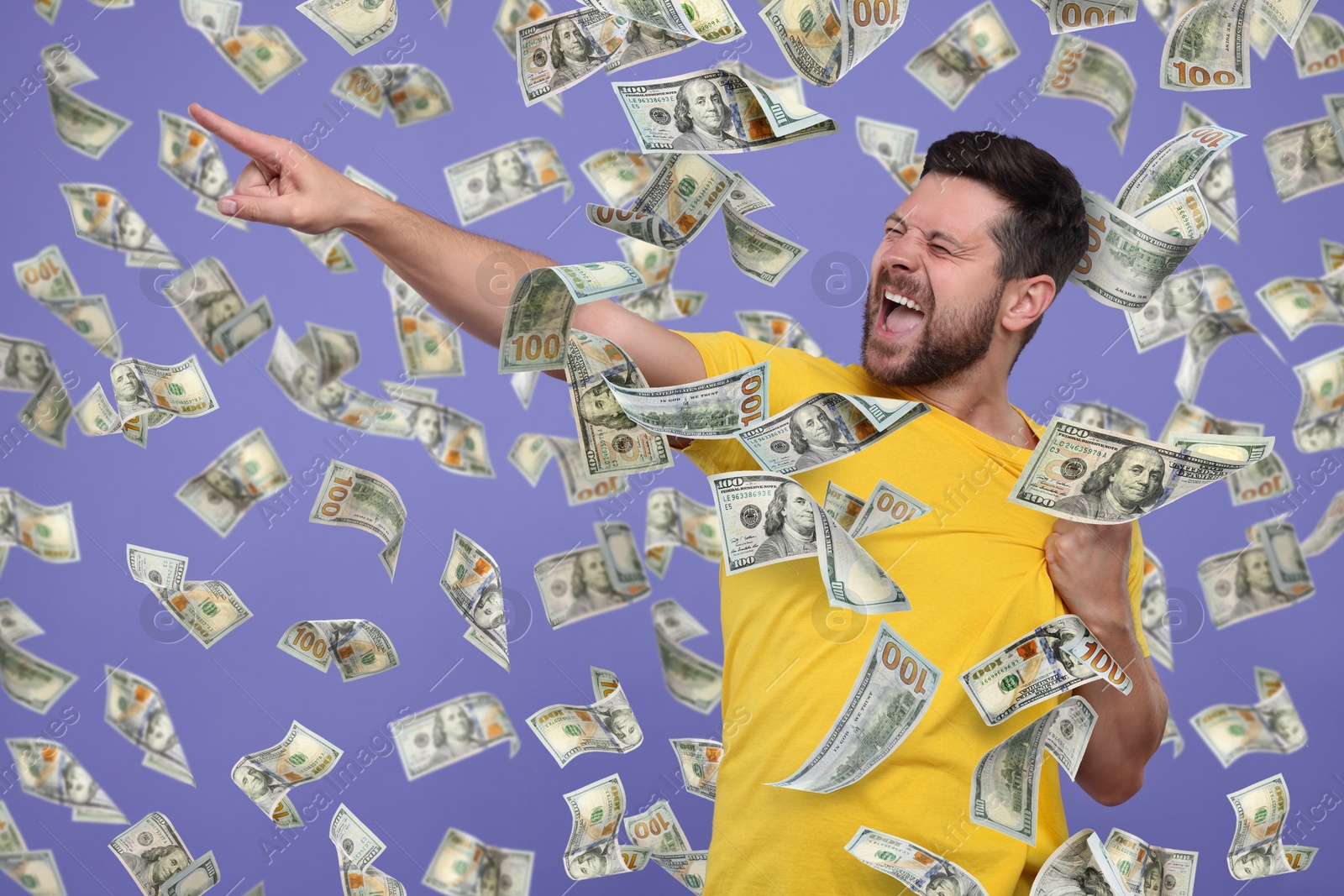 Image of Happy man under money rain on violet background