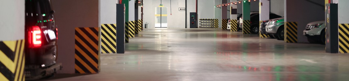 Image of Modern parking garage with cars, banner design