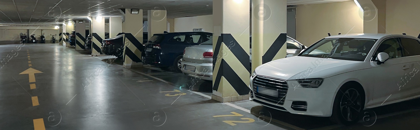 Image of Underground parking garage with cars, banner design