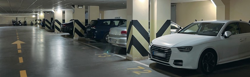 Image of Underground parking garage with cars, banner design