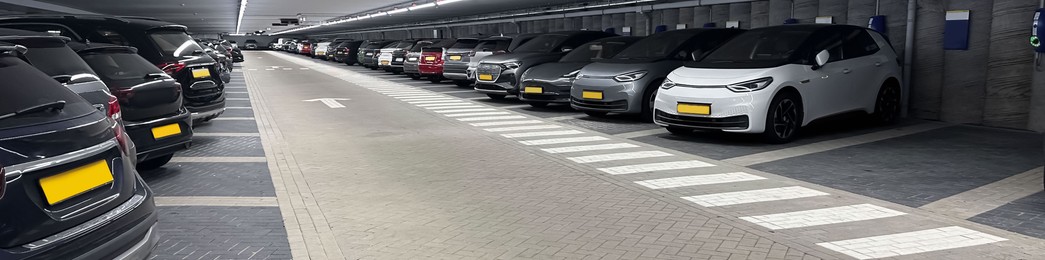 Underground parking garage with cars, banner design