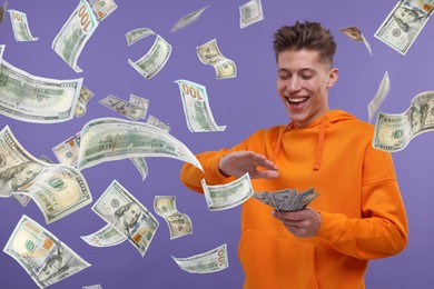 Happy man throwing money on dark violet background. Dollar bills in air