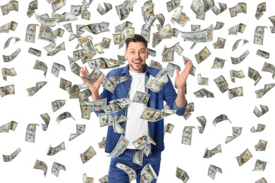 Image of Happy man under money rain on white background