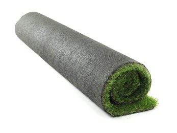 Photo of Roll of green artificial grass isolated on white