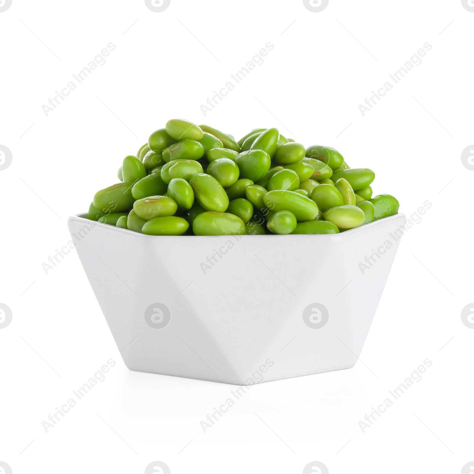 Photo of Raw green edamame soybeans in bowl isolated on white