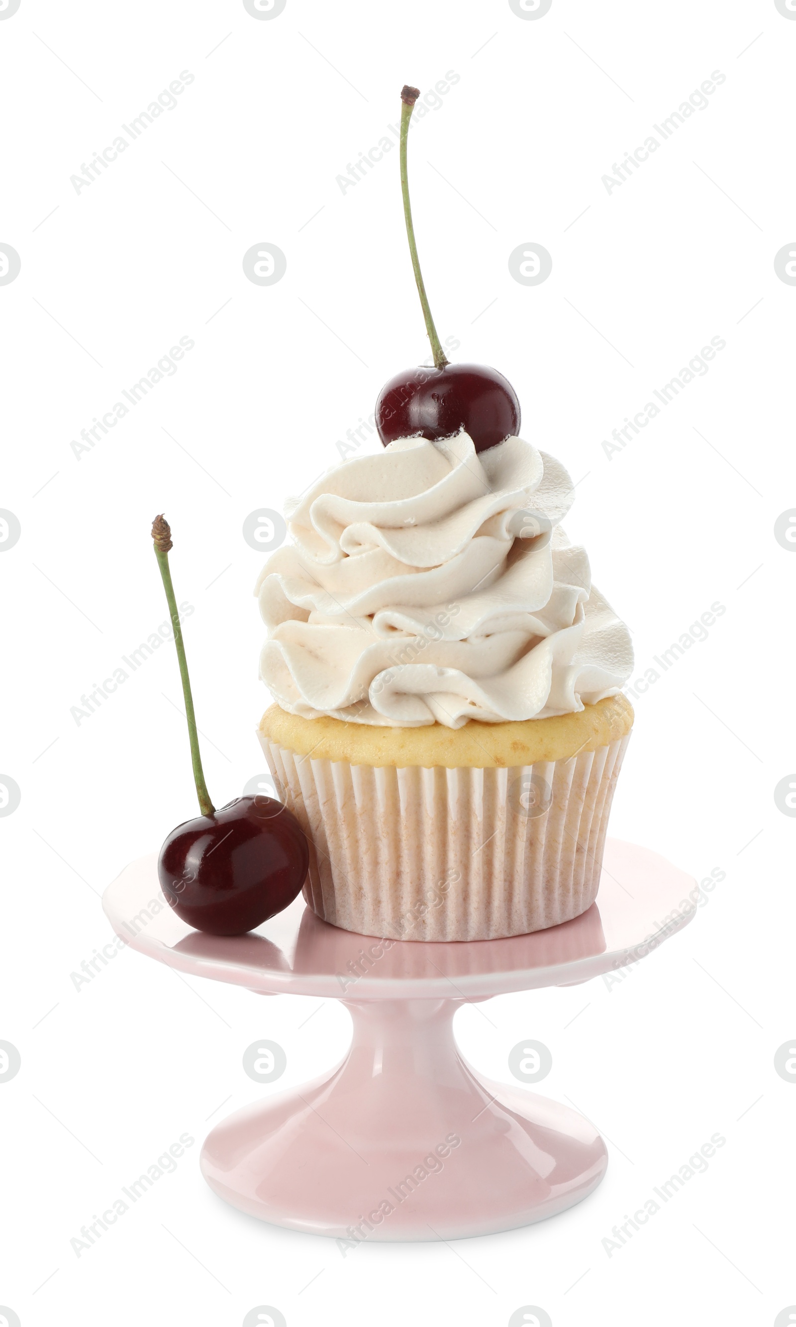 Photo of Delicious cupcake with cream and cherries isolated on white