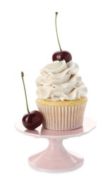 Delicious cupcake with cream and cherries isolated on white