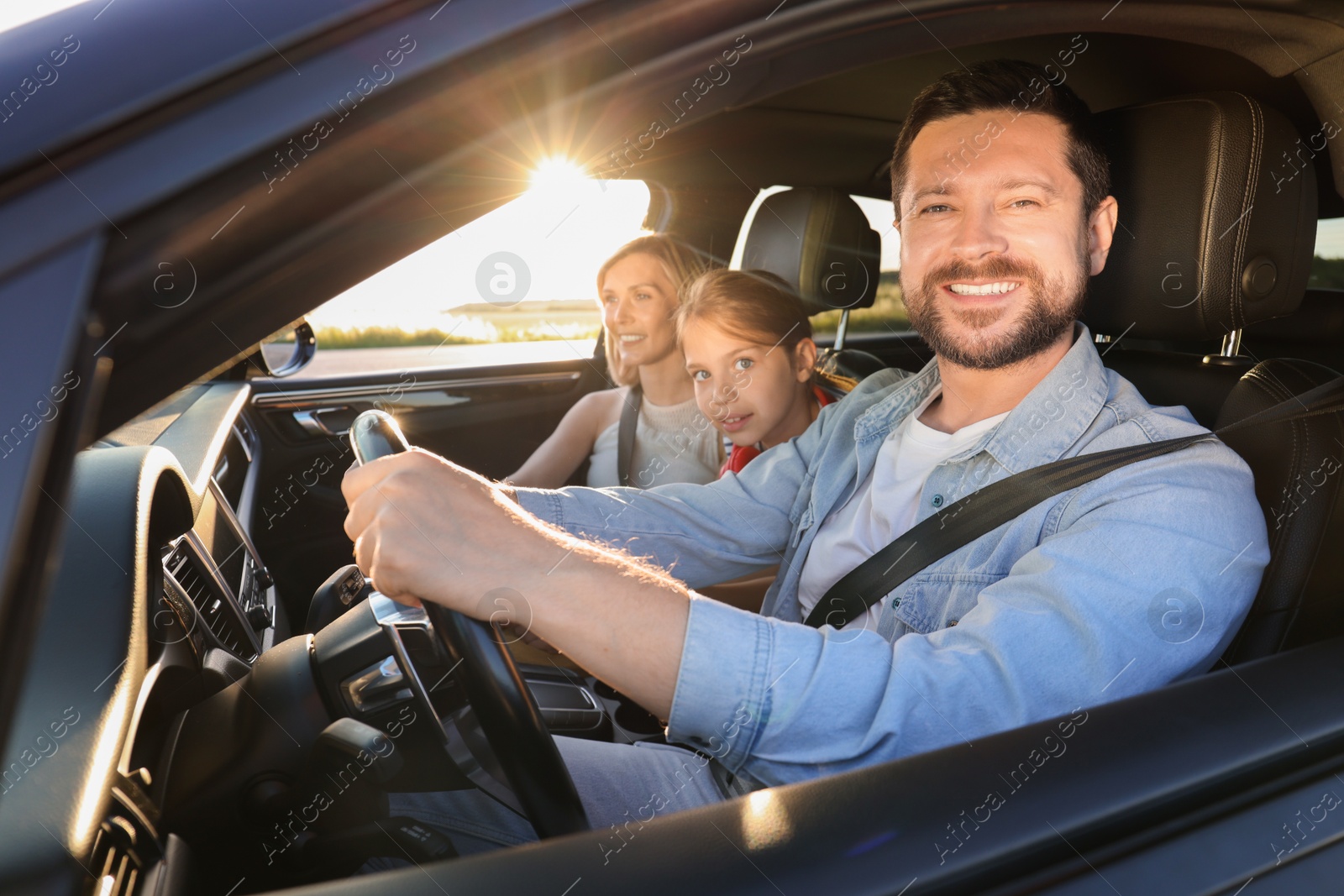 Photo of Happy family enjoying trip together by car, view from outside