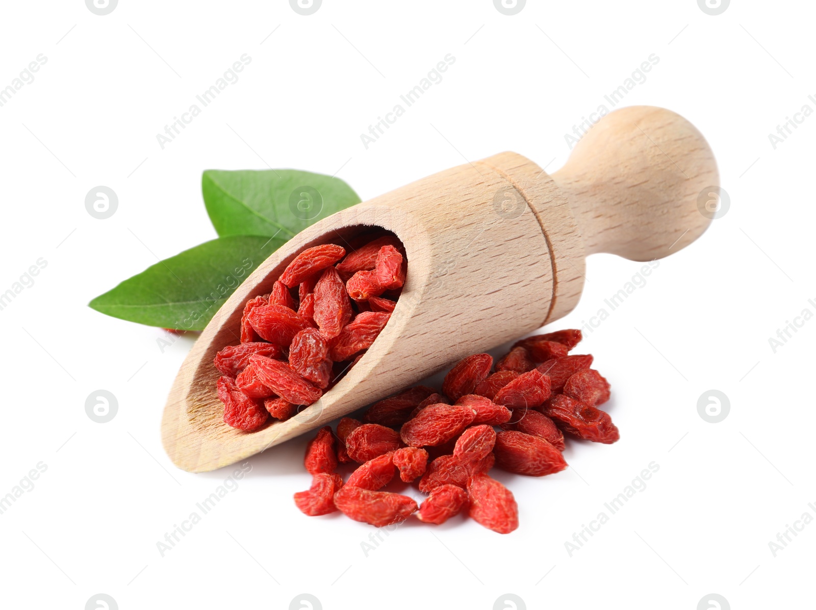 Photo of Dried goji berries, green leaf and wooden scoop isolated on white