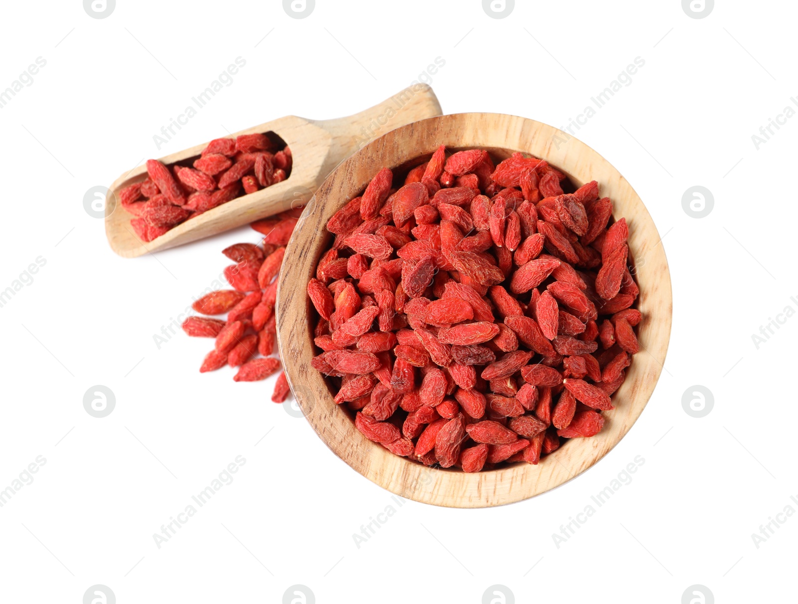 Photo of Dried goji berries in bowl and scoop isolated on white, top view