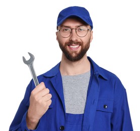 Professional auto mechanic with wrench on white background