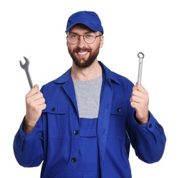 Professional auto mechanic with tools on white background