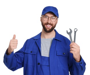 Professional auto mechanic with tools on white background