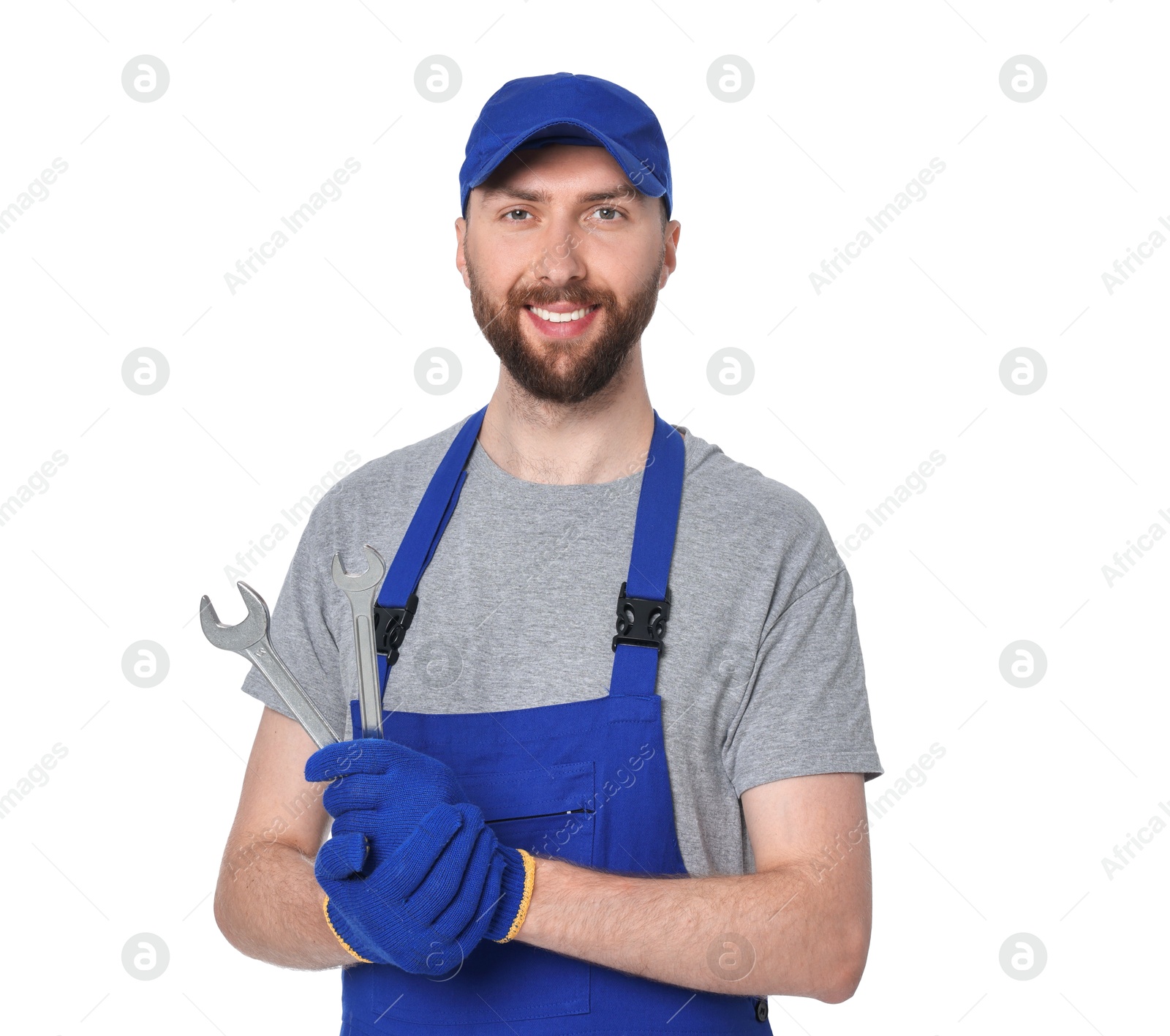 Photo of Professional auto mechanic with tools on white background