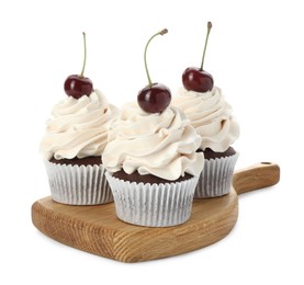 Delicious cupcakes with cream and cherries isolated on white